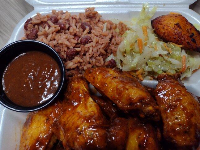 (2)Jerk Chicken Wings Combo (10 pcs) -Enjoy 20 delicious wings perfectly paired with rice & peas, steamed cabbage, and sweet plantains.