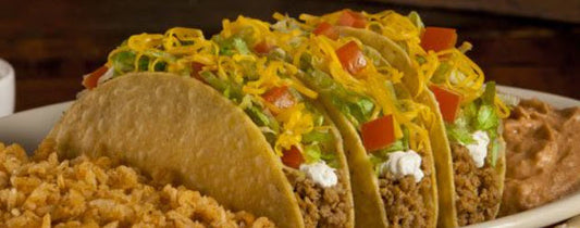 Wicked Taco Supreme (3 Beef Tacos)-  Topped with lettuce, pico de gallo, guacamole, cheese, and sour cream. Served with rice and pinto beans on the side