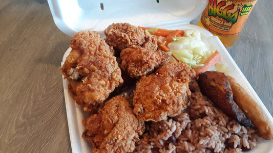 Ackees Original Fried Chicken Dinner! Our crispy, golden fried chicken comes with stewed cabbage, rice, peas, and plantain. Tthis meal will satisfy your taste buds and leave you feeling satisfied. Experience it now!