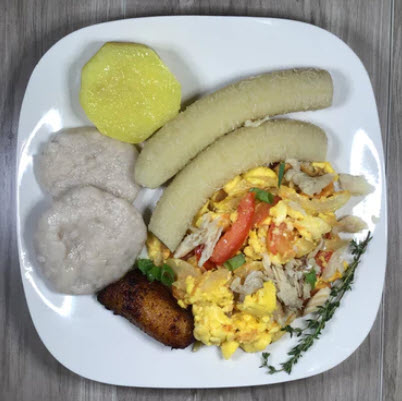 Ackee & Saltfish w/ Food-(LG) This traditional Jamaican dish well seasoned Ackee &amp; Saltfish served with a&nbsp; combination of boiled yam, banana, dumpling, and sweet plantain. A rich blend of flavors and textures, perfect for any meal of the day.