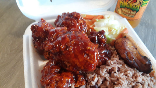 Barbi Sweet- Chili Fried Chicken Dinner -  Tender chicken, paired with our sweet and spicy chili sauce, served with a side of nutritious stewed cabbage, rice, peas, and plantains.
