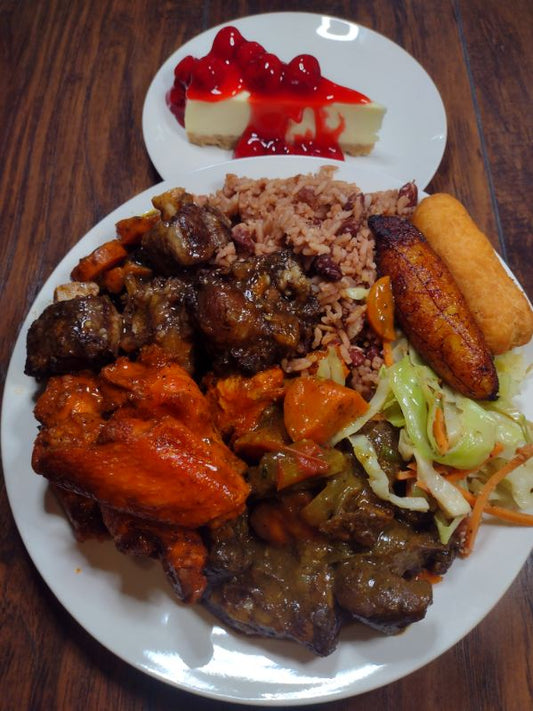 Buffalo Soldiers - 5 spicy Buffalo Wings, Tender Ox Tails,Flavorful Curry Goat.  with a side of rice &amp; peas, stewed cabbage, festival, and sweet plantain. Finish off your meal with a slice of decadent cherry cheesecake. A true feast for the senses!