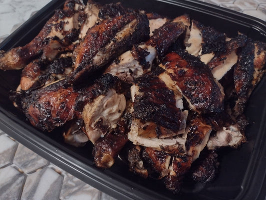 Jerk Chicken By  The Pound-Made with traditional Ackees Jamaican spices and grilled to perfection, each bite is bursting with a mouthwatering blend of heat and tang. A must-try for any food lover looking for an elevated and satisfying meal experience.