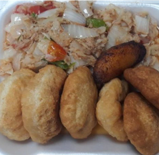 Stewed Saltfish w/ Fried Dumplings. (LG) Made with authentic ingredients and traditional cooking techniques, this dish boasts a flavorful blend of tender saltfish and crispy fried dumplings.