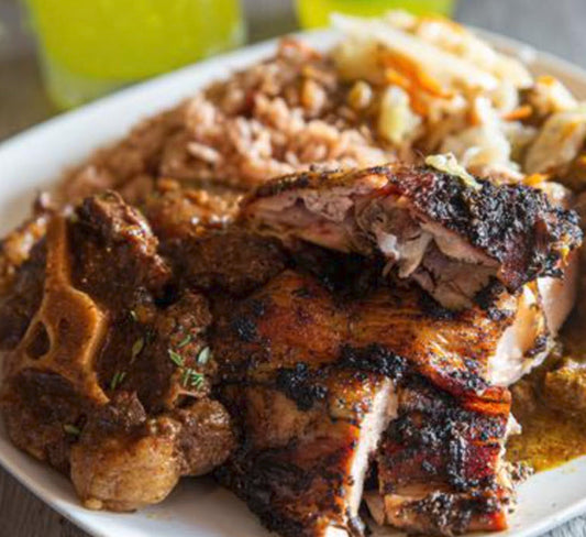 (2) Triple Threat (Ox Tails, Jerk, Goat) - A taste of Jamaica.  served with classic sides like rice &amp; peas, steamed cabbage, festival, and sweet plantains.